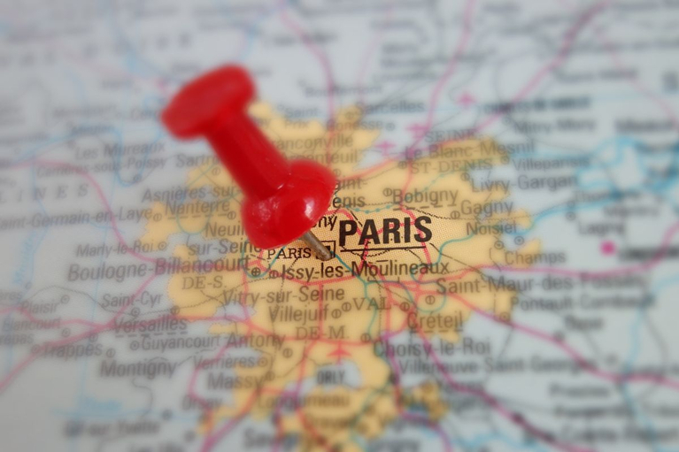 Map of Paris, France with a map pin.