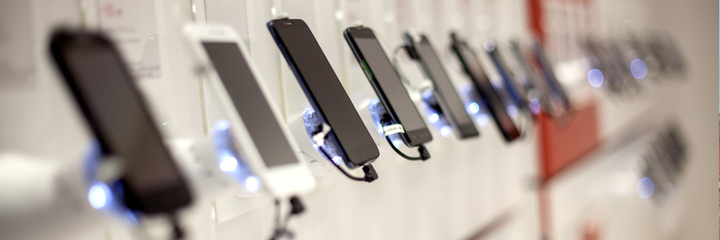 Smartphones in a shop display.