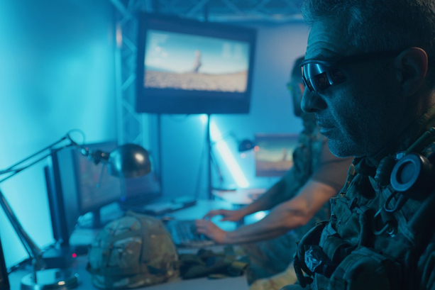 Military man working at desk