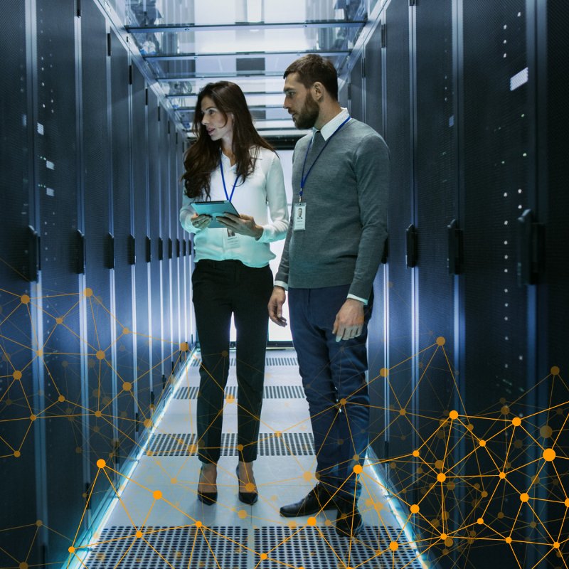 Man and woman in server room.