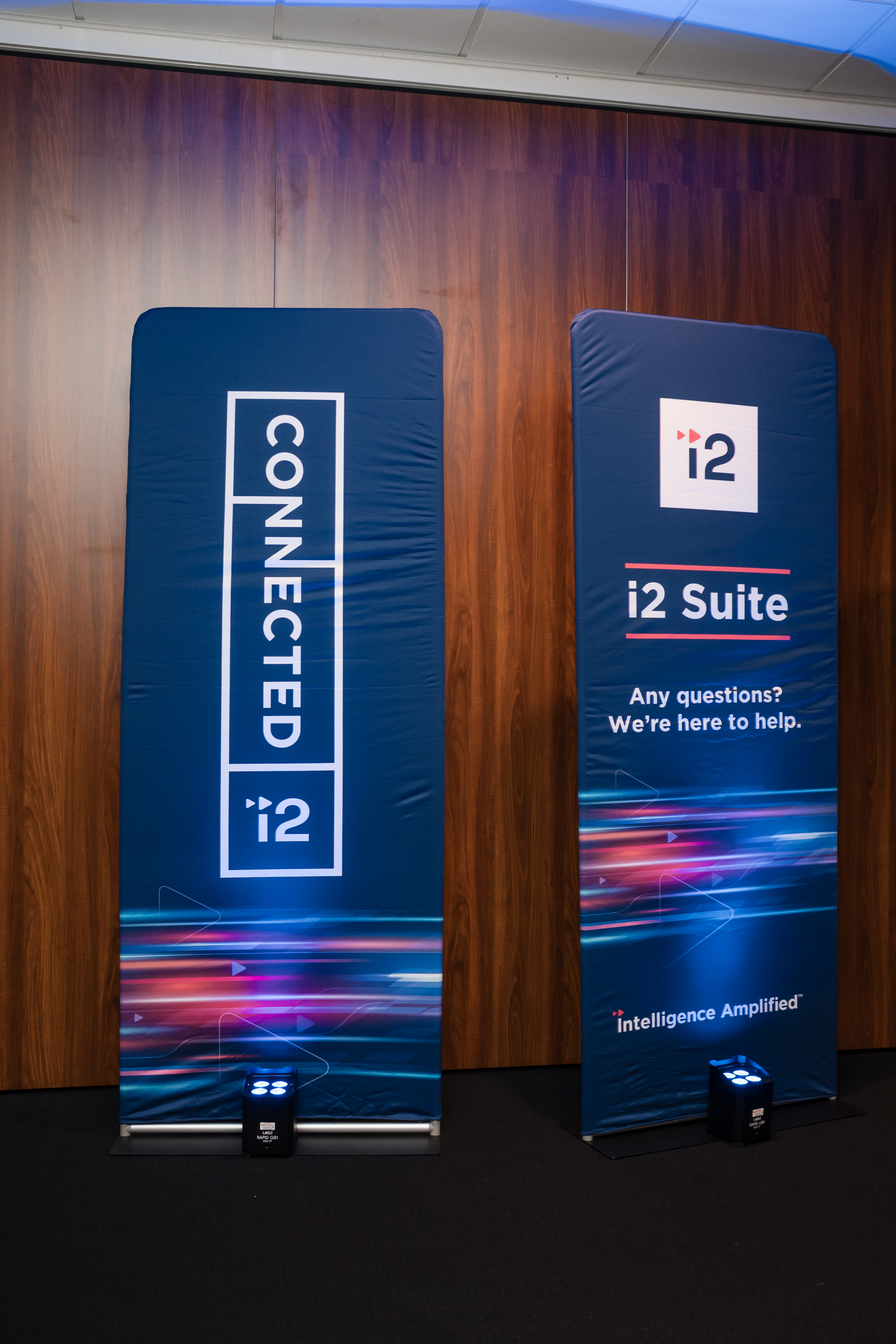 Connected i2 and i2 Suite banners at the event