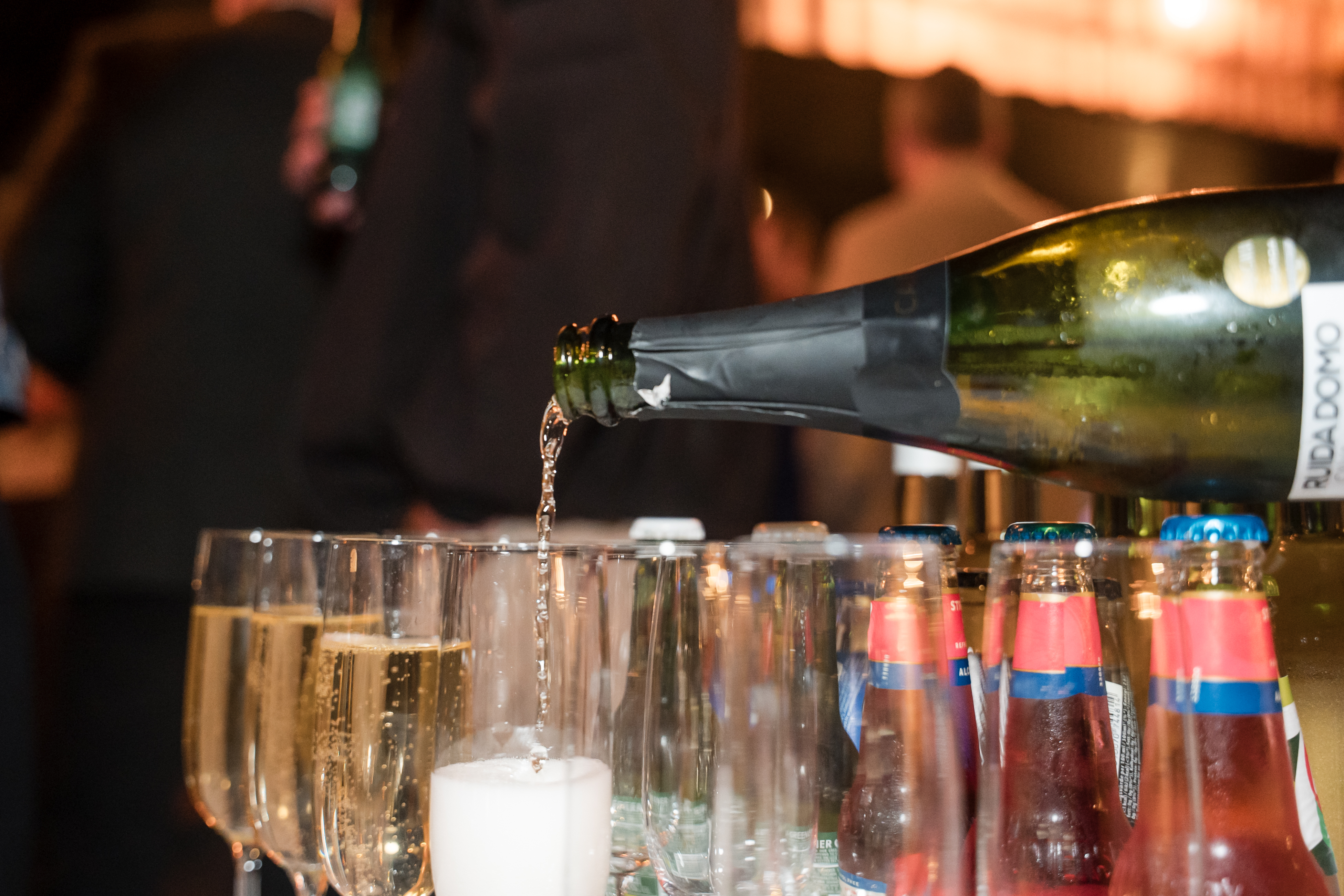 Drinks being poured at the evening reception